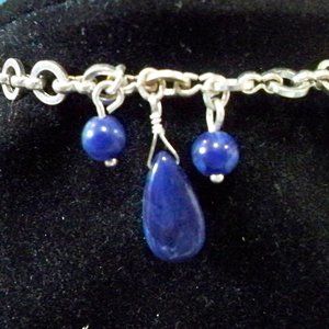 AVON  BRACELET SILVER TONE WITH BLUE BEADS